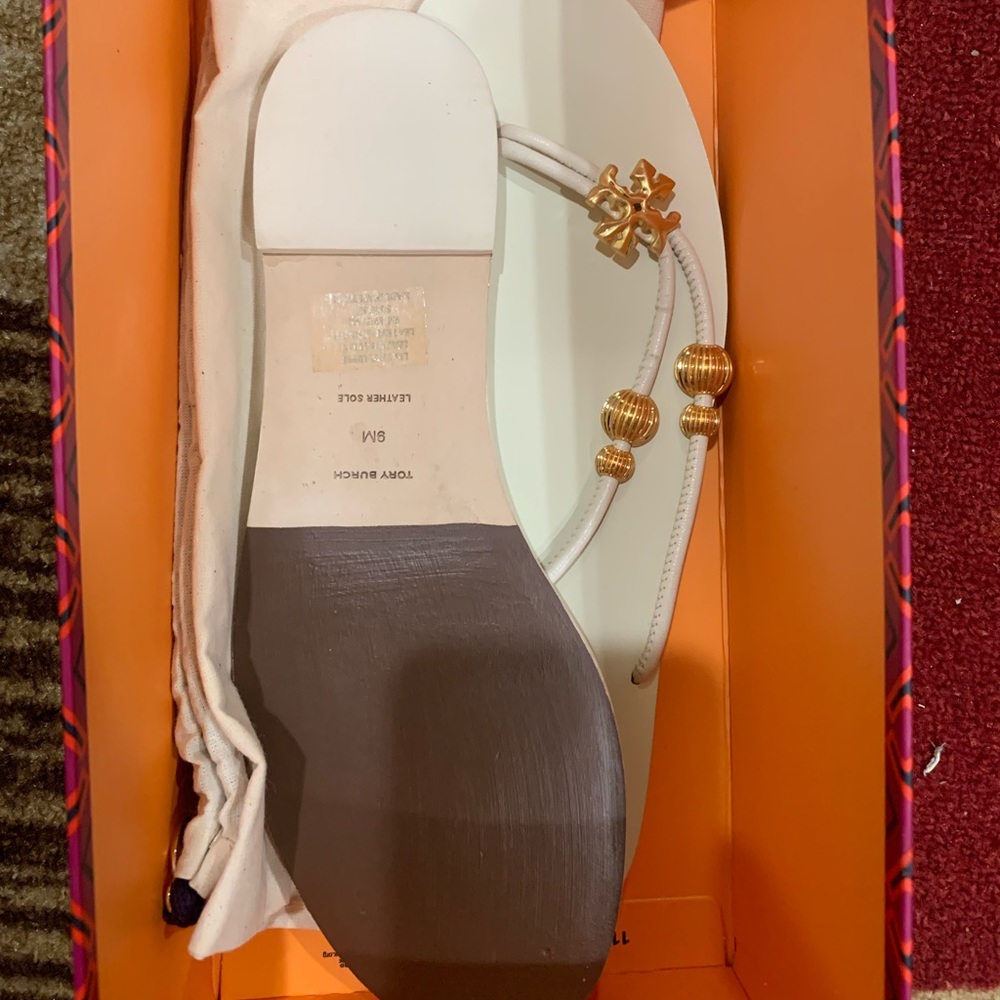 Gleaming beads and iconic Tory Burch hardware